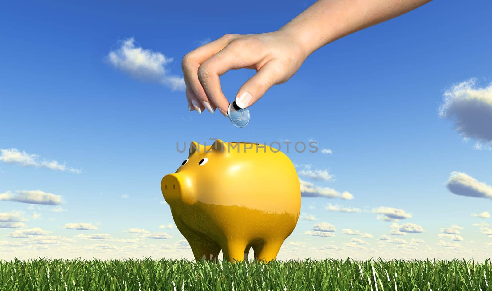 Woman hand inserting a coin into a yellow ceramic piggy bank placed on a green grass meadow, viewed from a side close up, with blue sky and fluffy clouds.