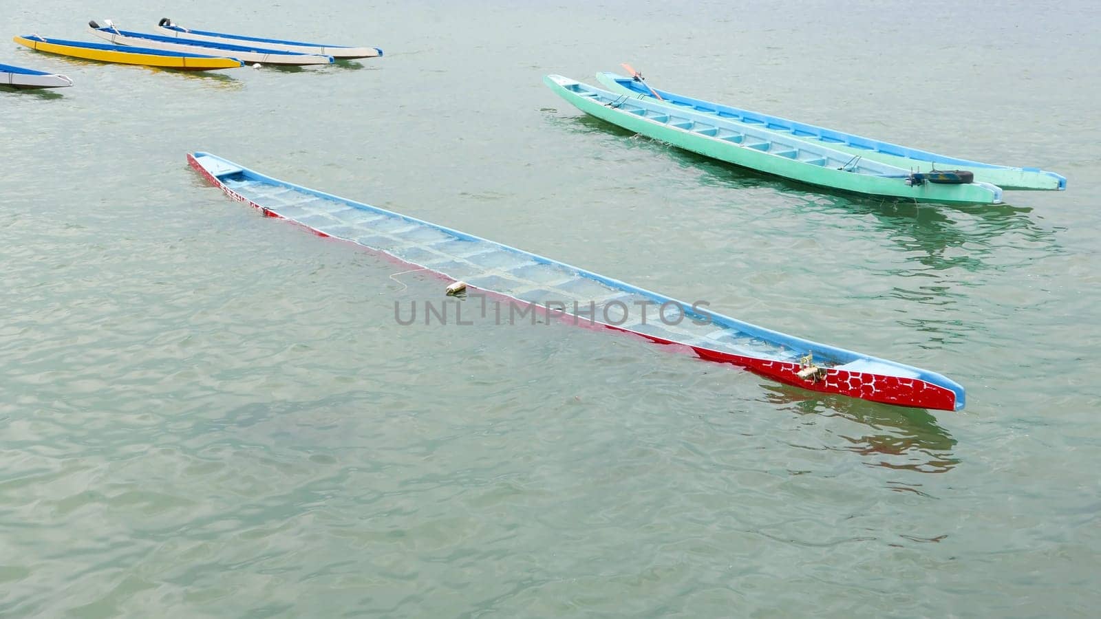 Dragon boats are parked on the lake