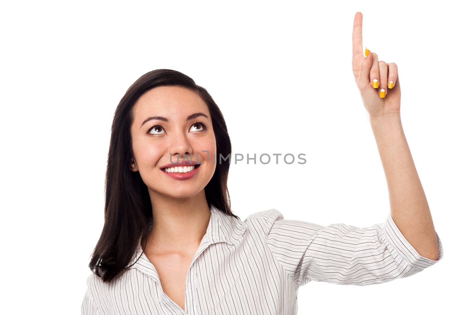 Smiling female associate pointing up