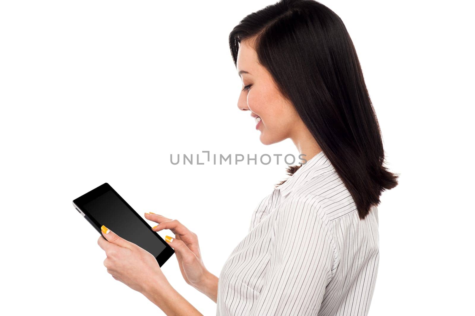Pretty employee browsing on tablet