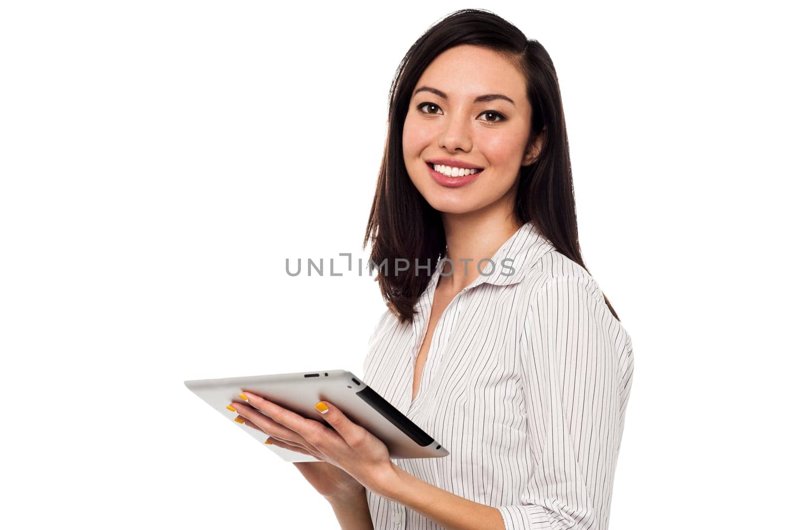 Young pretty employee surfing on tablet device