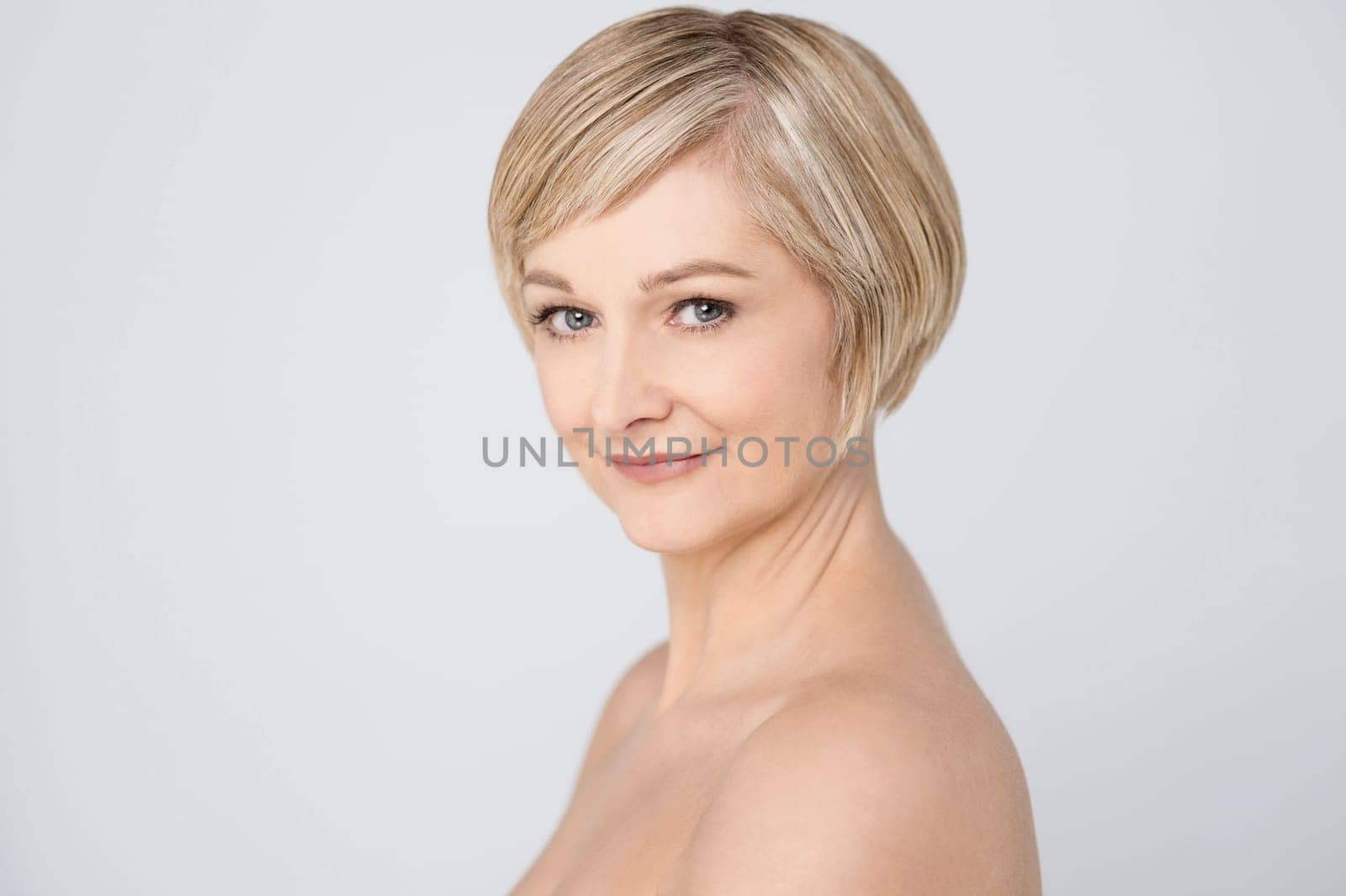 Sideways image of a woman posing to camera