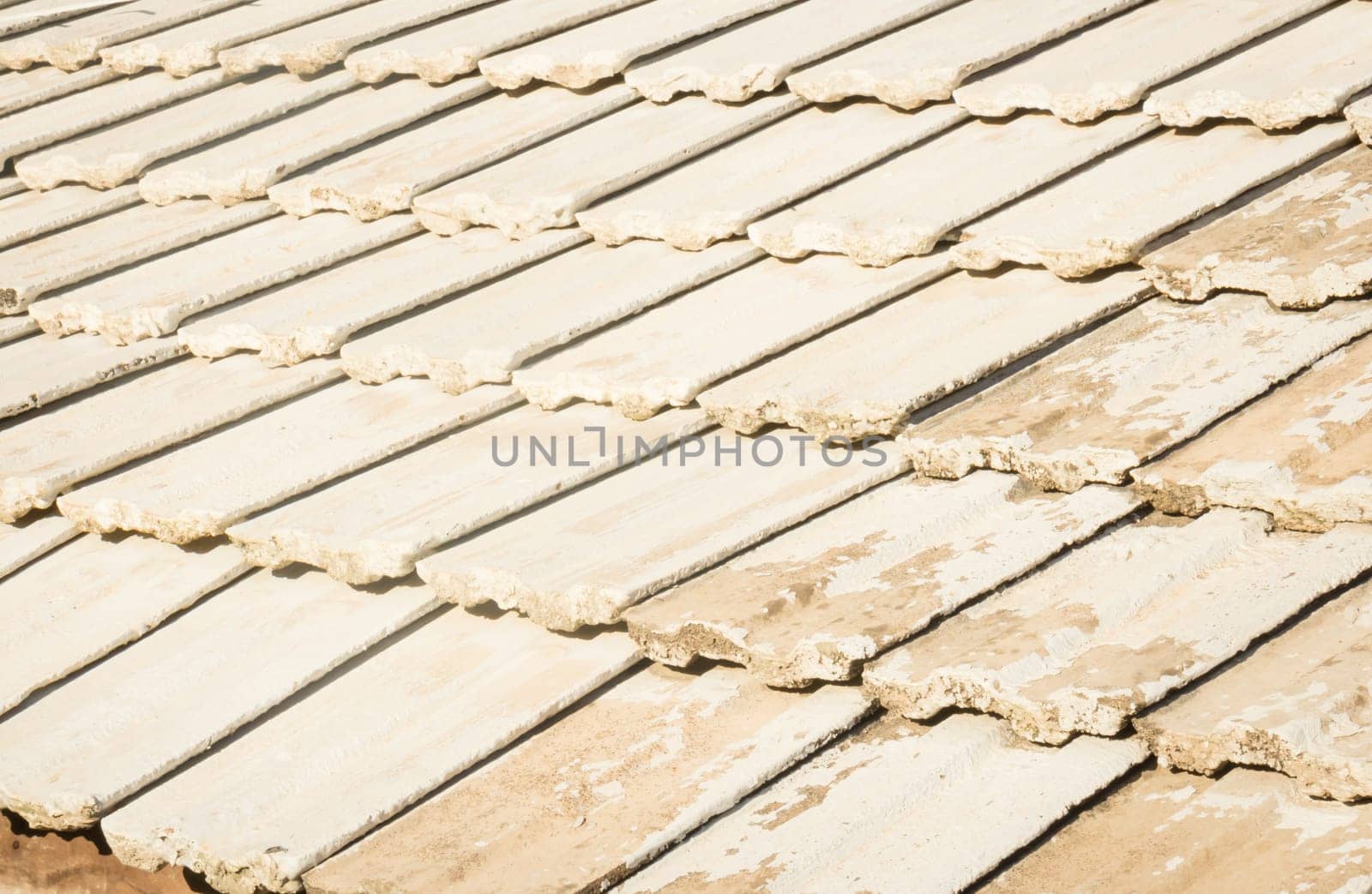 Pattern of tiles on the old roof , stock photo
