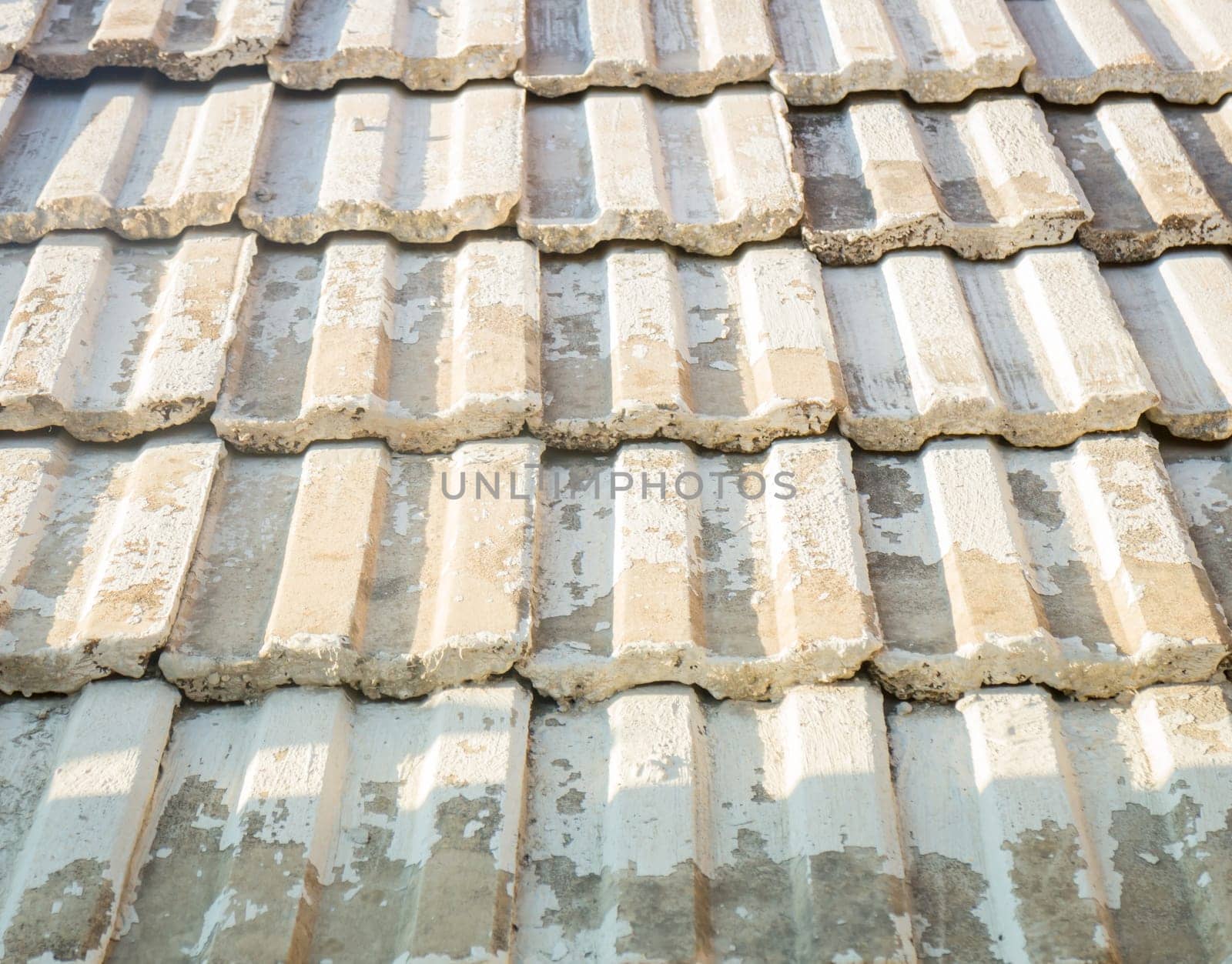 Pattern of tiles on the old roof , stock photo