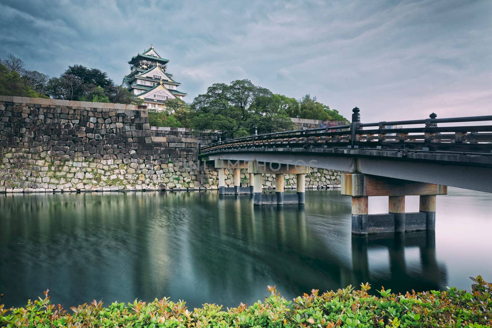 Osaka Castle at sunset in Japan, landmark of Unesco.