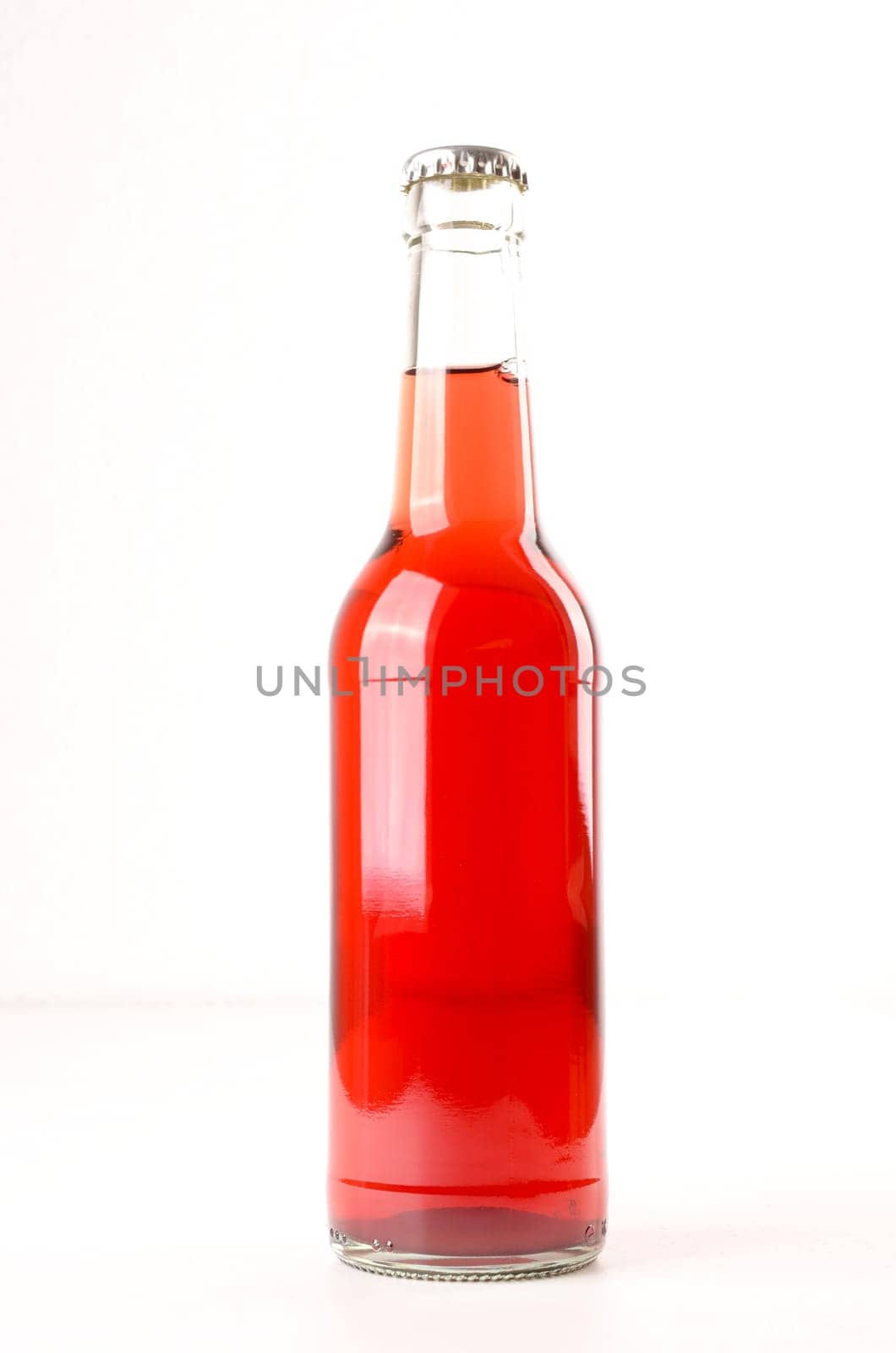 Bottle of elder juice on a white background