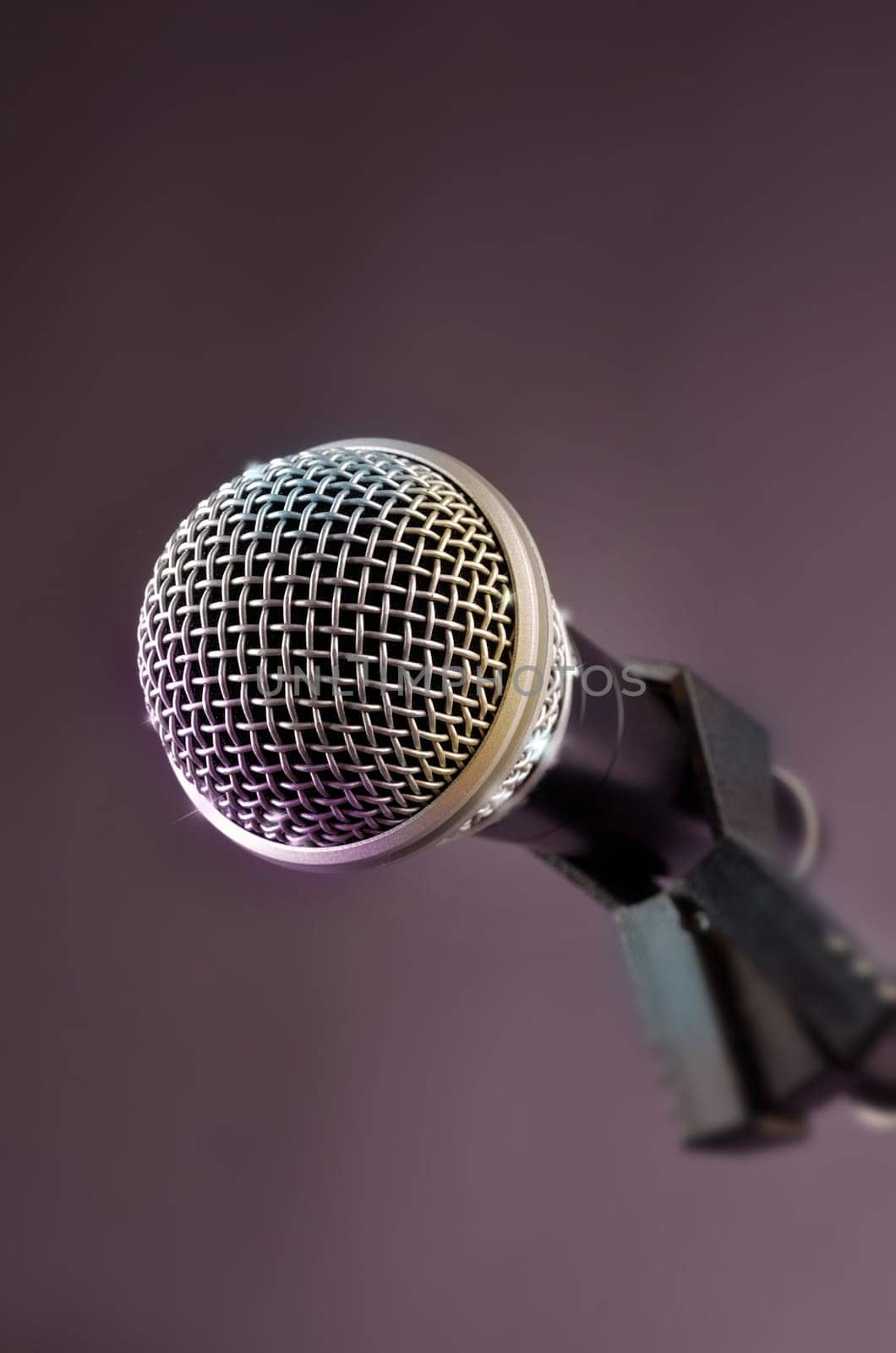 Microphone in a studio with glittering lights and effects