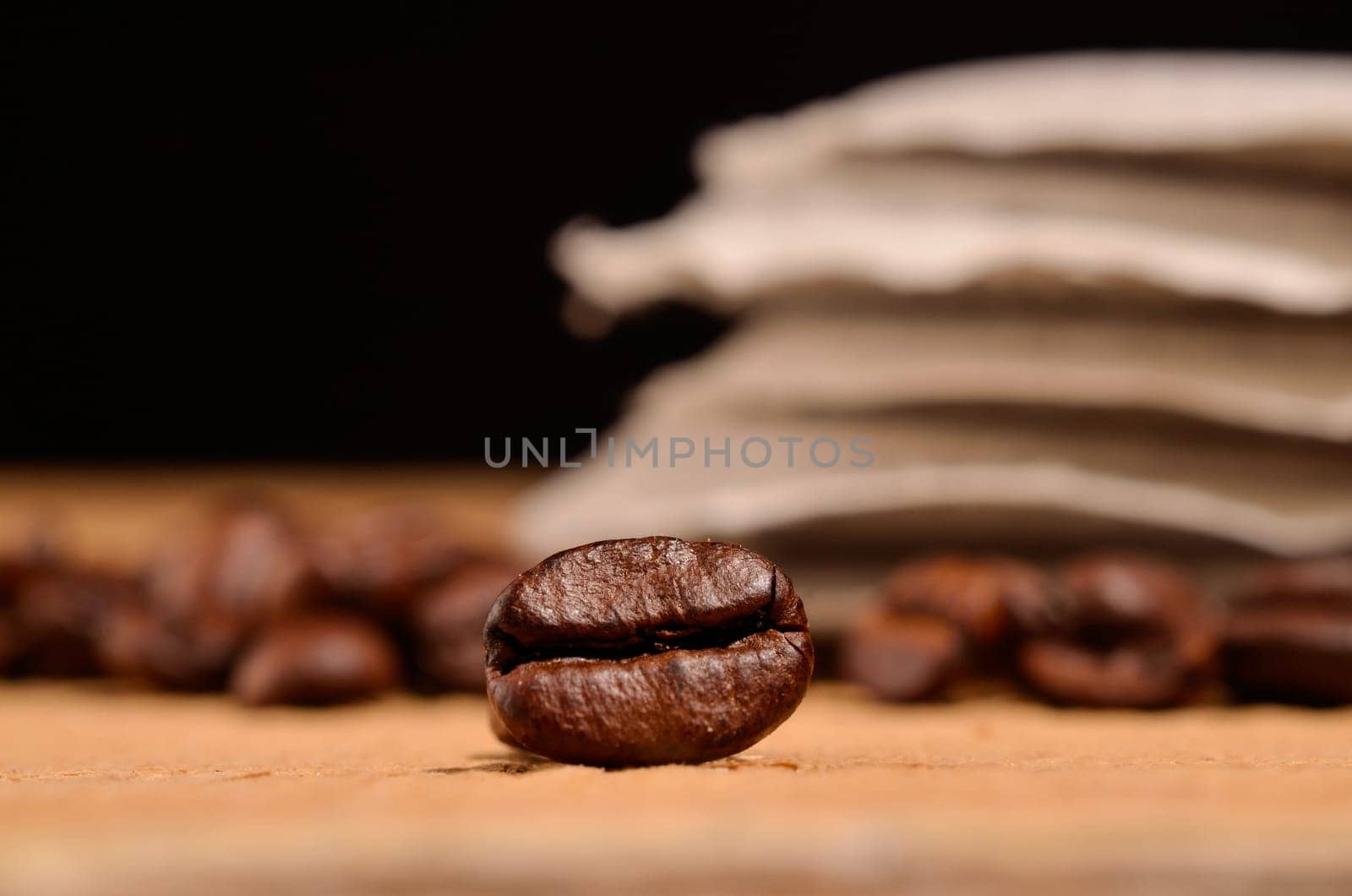 Close up of an espresso bean on a table with coffee pads