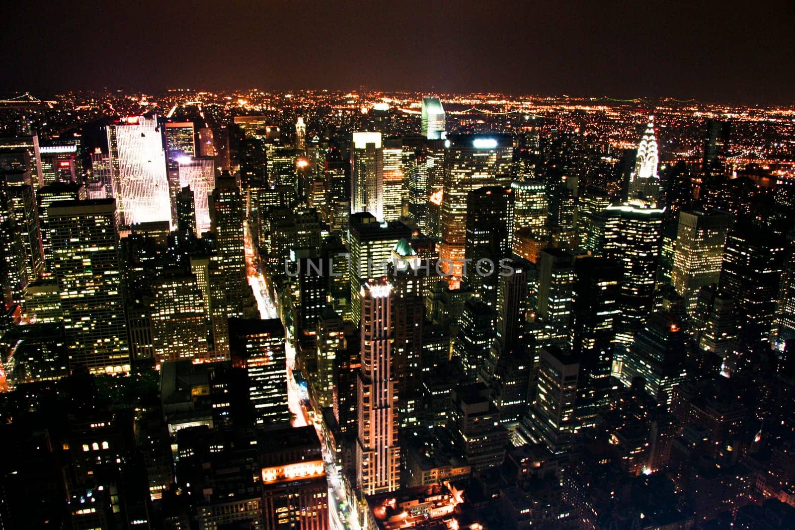 This is a partial view of a city's buildings and structures against the sky of New York