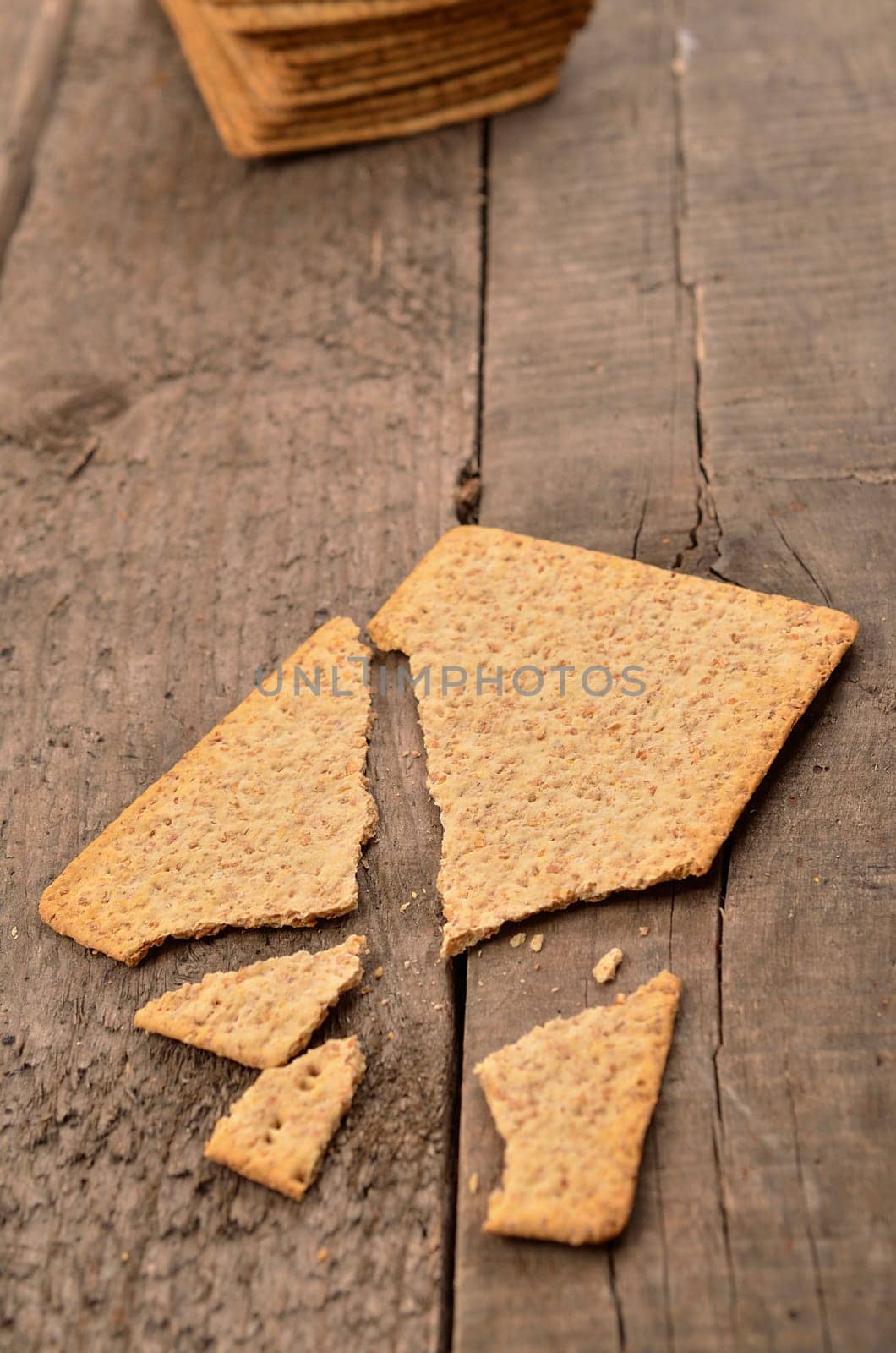 Whole grain bread on a rustic wooden table