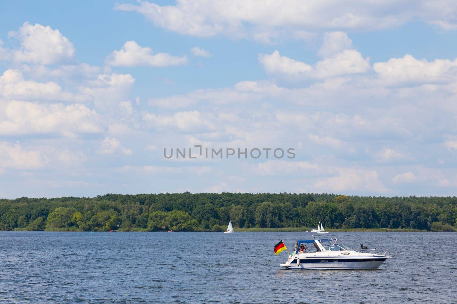 Small motorboat with a large flag