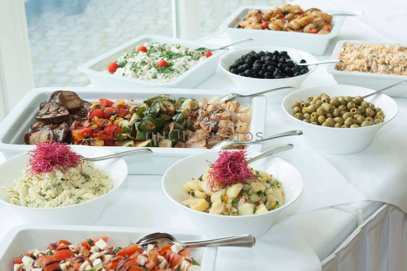 Various salads prepared on a table