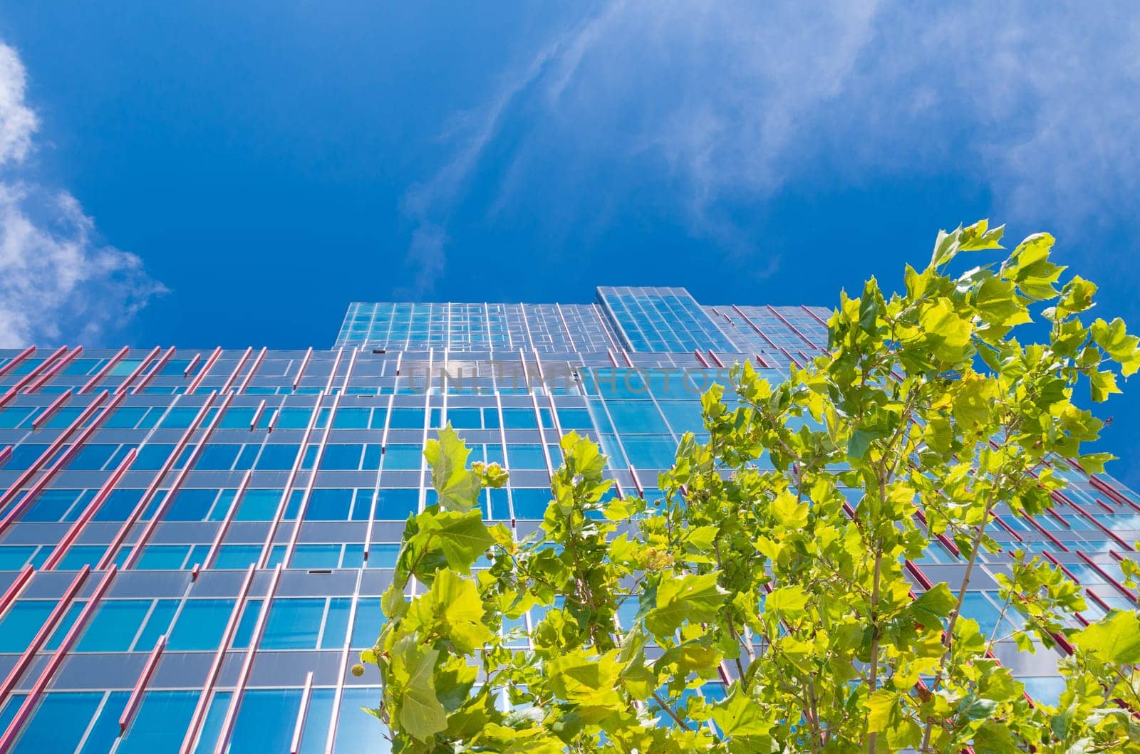 facade of a modern office building in Almere, netherlands. It is the youngest and fastest growing city in the country, founded around 1975.