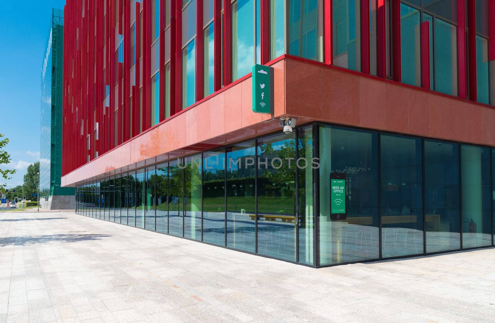 facade of a modern office building in Almere, netherlands. It is the youngest and fastest growing city in the country, founded around 1975.