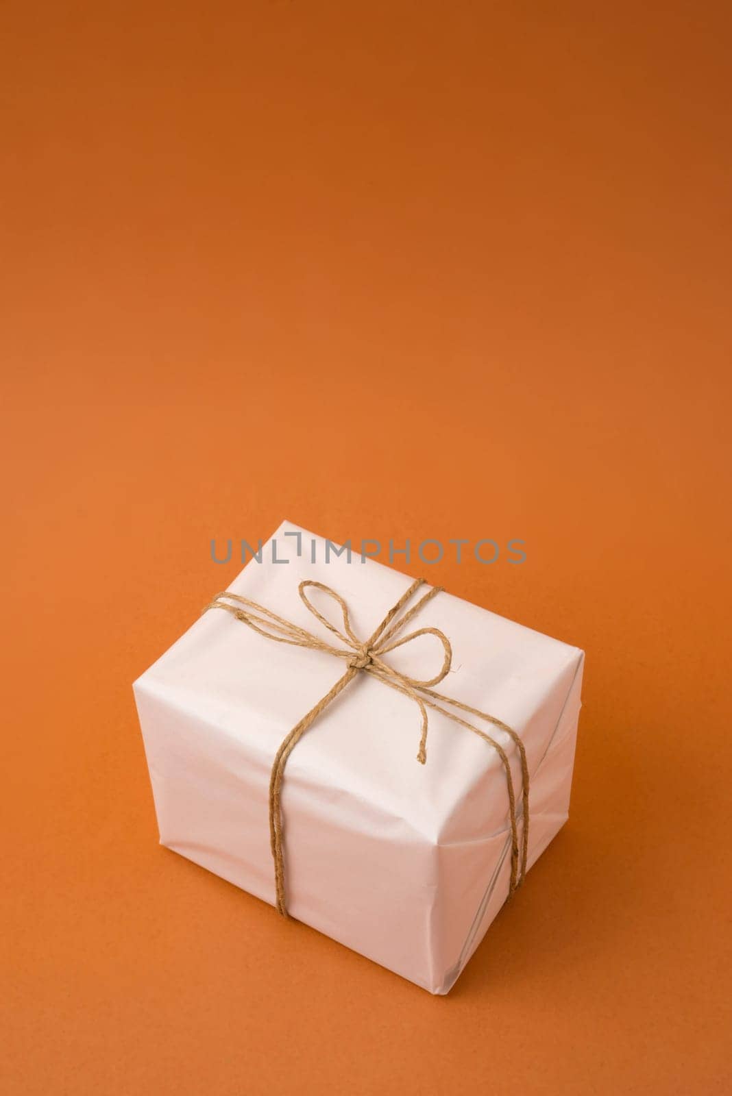 Simple gift box concept template on empty background with copy space. Ideal for sale or campaign.
