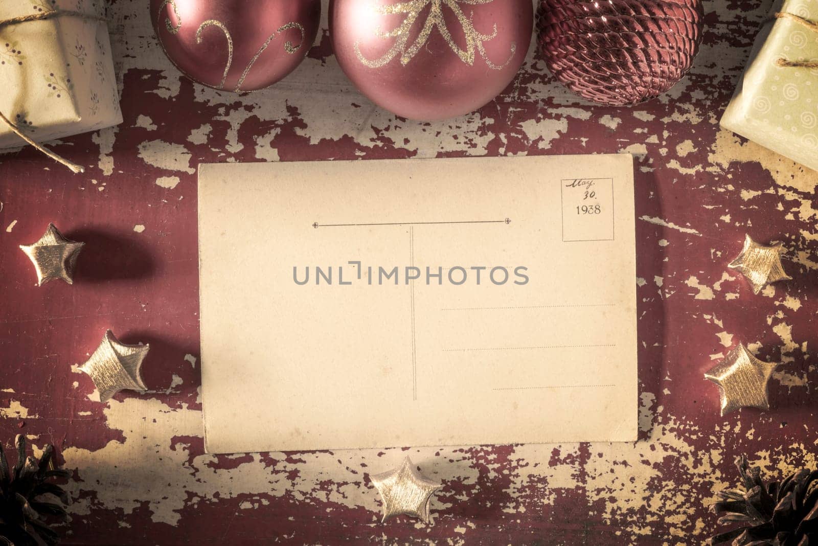 Merry christmas retro top view empty greeting card back on grunge wood texture background with holiday elements and vintage filter effect. Includes clipping path for postcard.