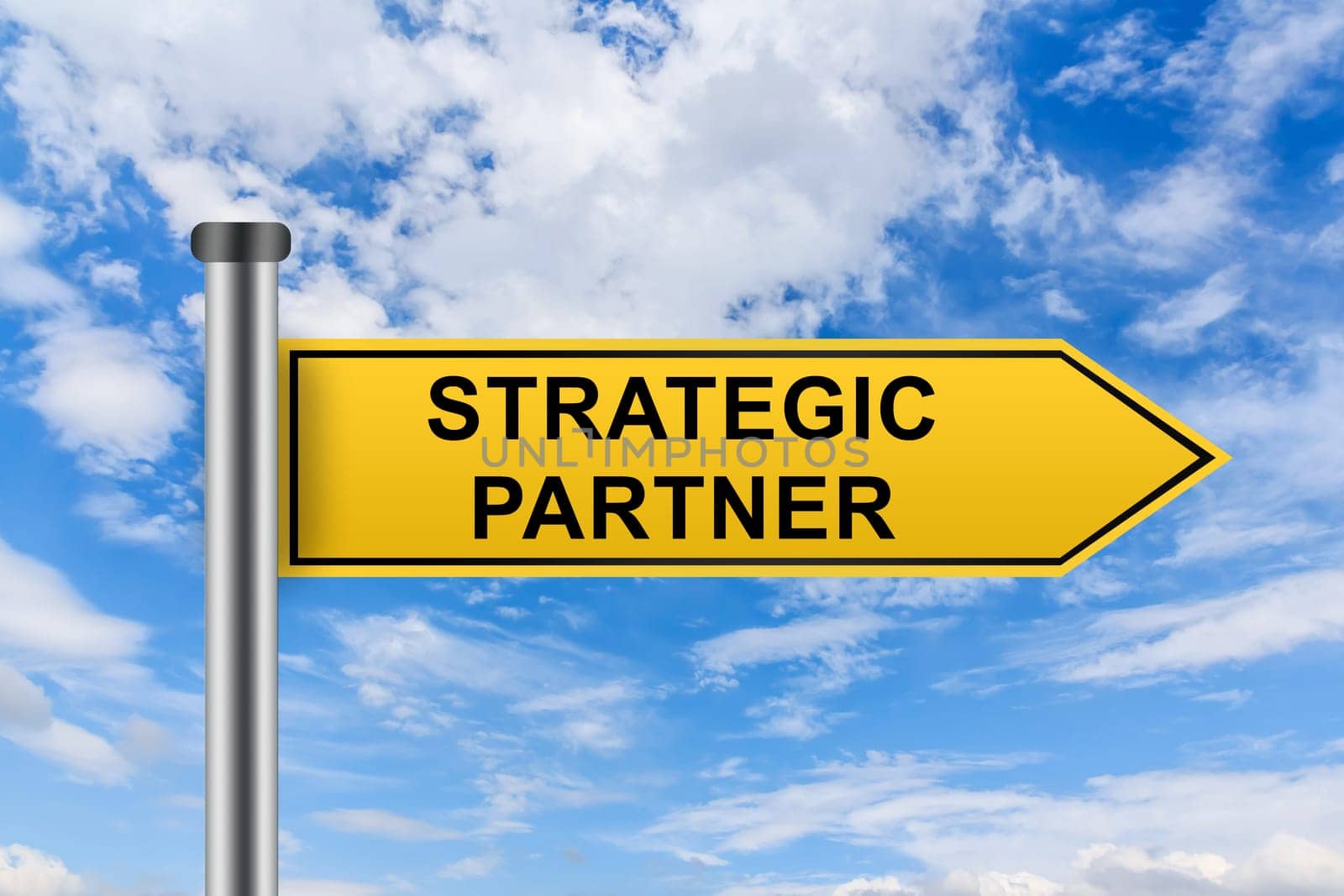 strategic partner words on yellow road sign on blue sky