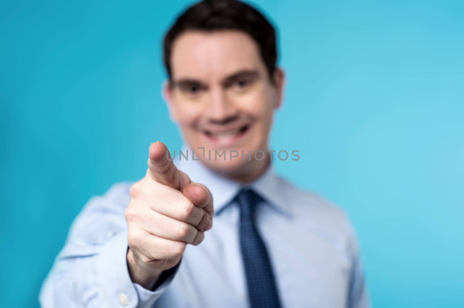 Business executive pointing you out