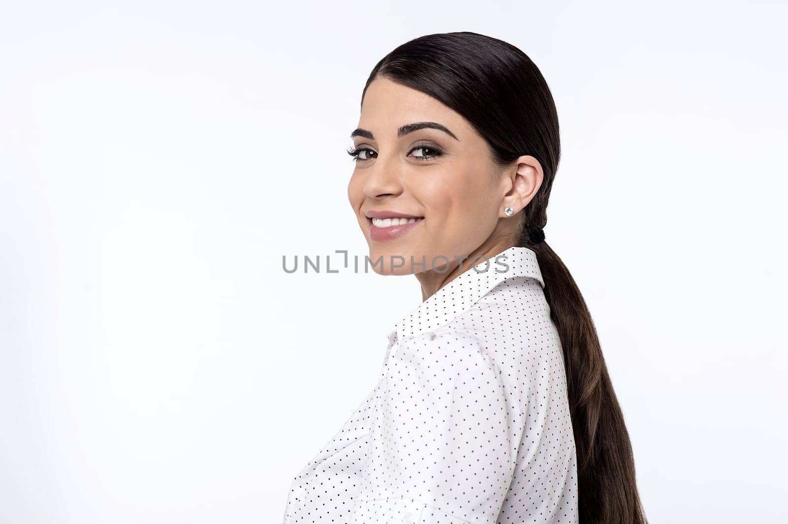 Pretty young woman looking over her shoulder