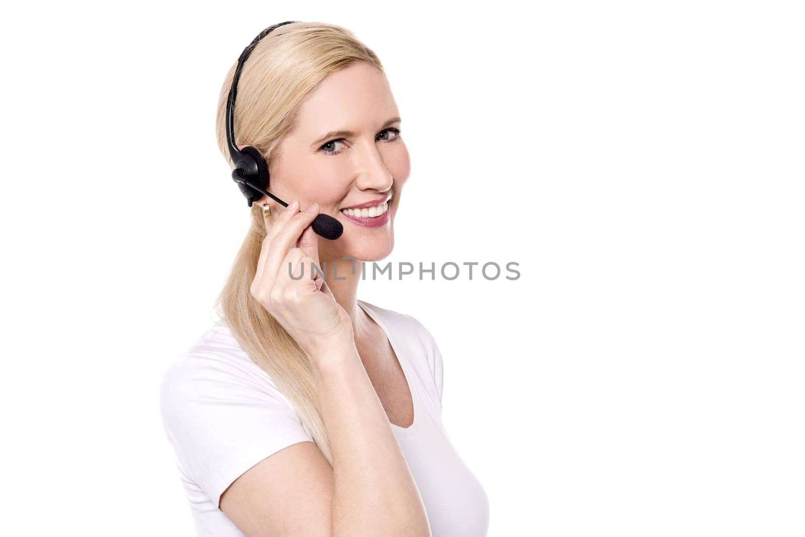 Happy customer support executive talking to her customer