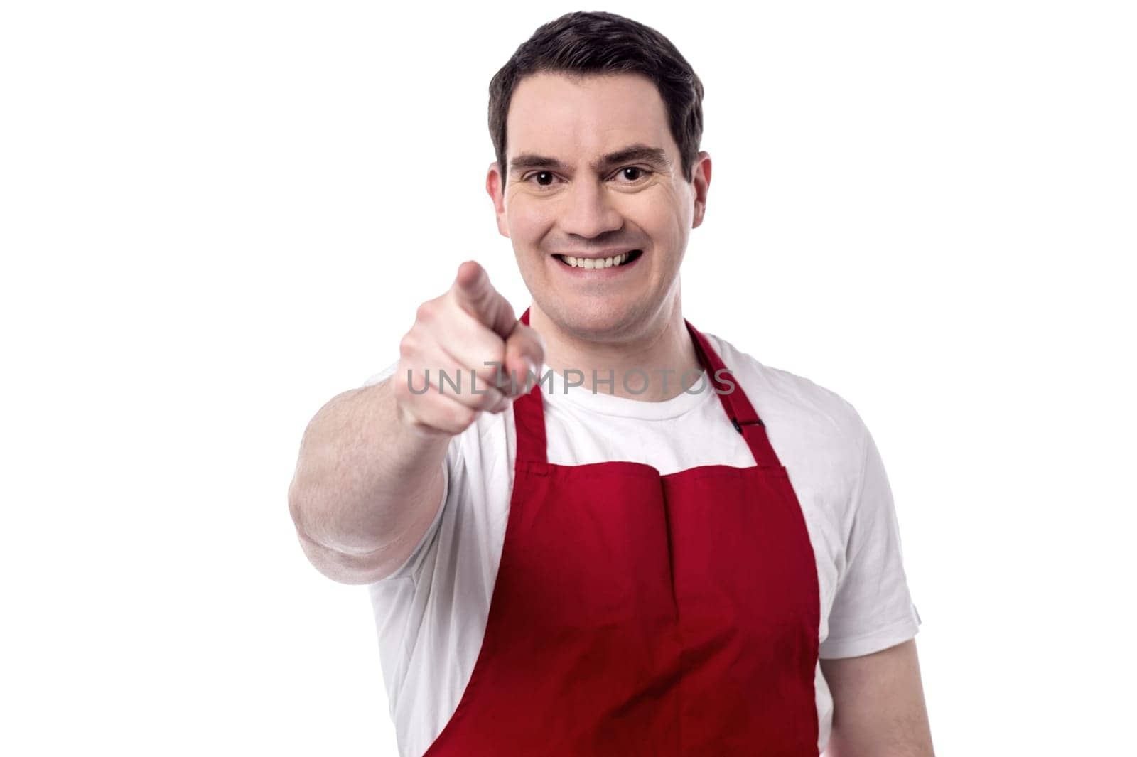 Male chef pointing towards something with smile
