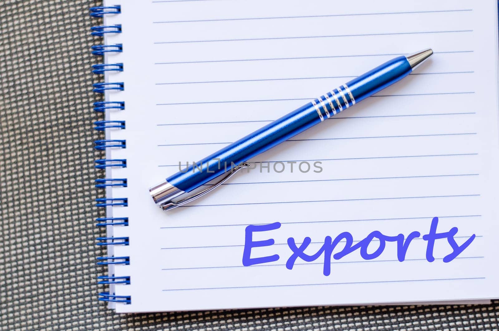 Exports text concept write on notebook with pen