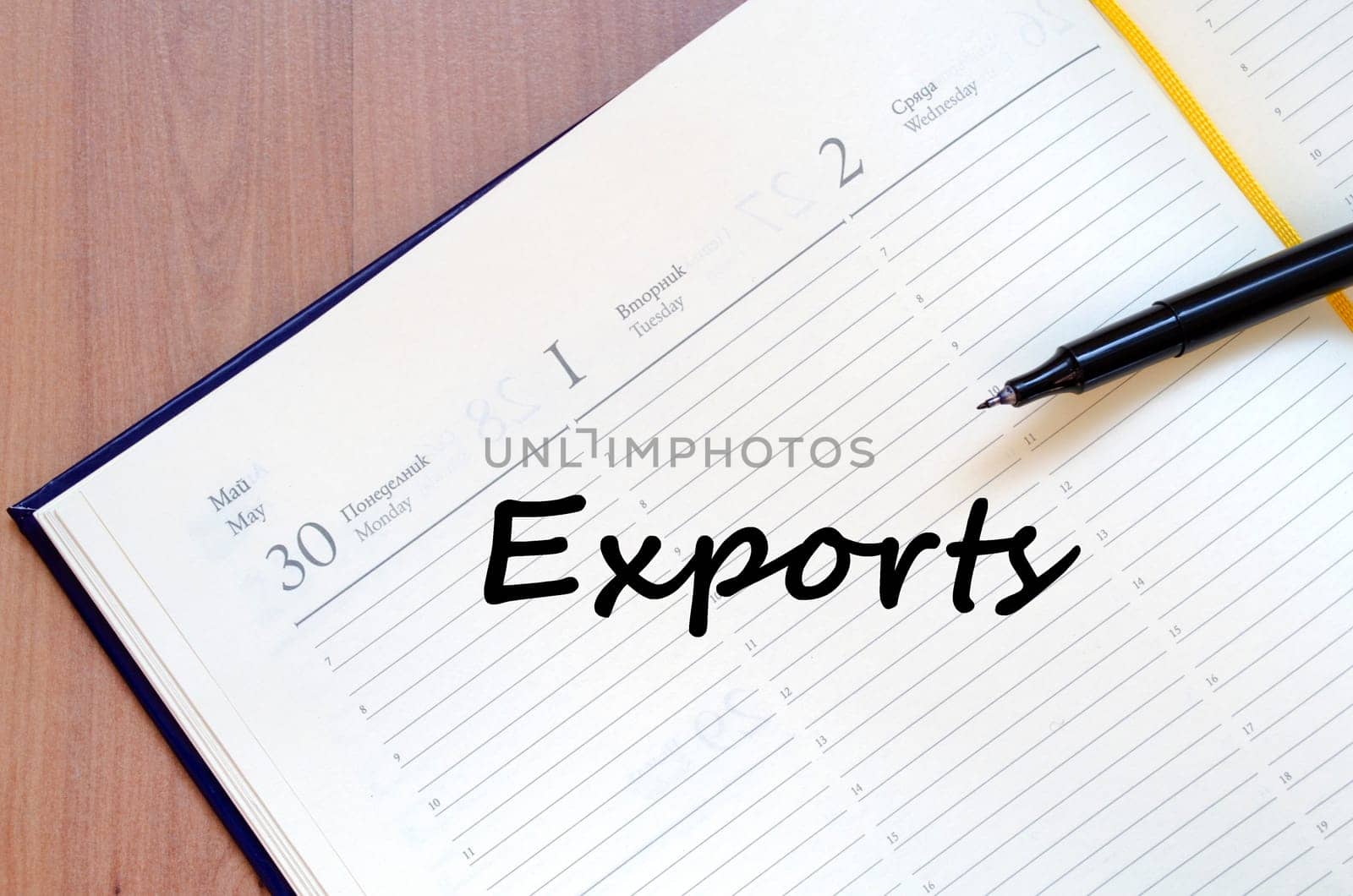 Exports text concept write on notebook with pen