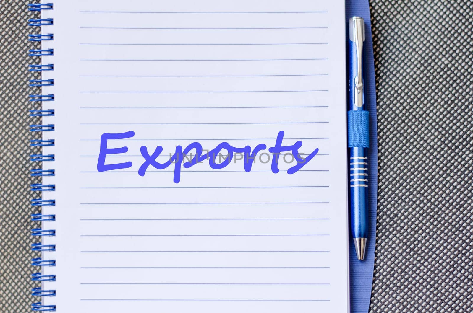 Exports text concept write on notebook with pen