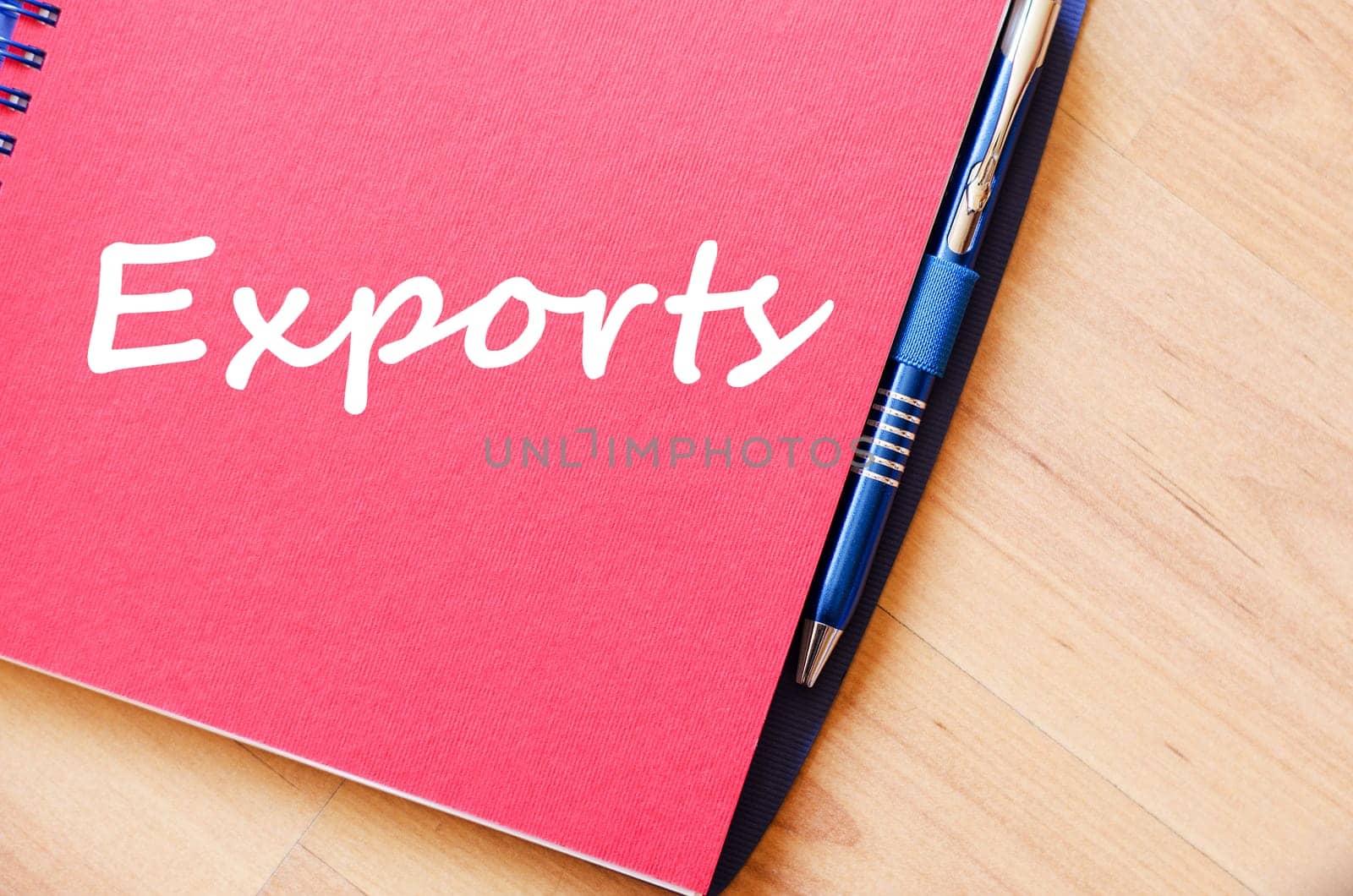 Exports text concept write on notebook with pen