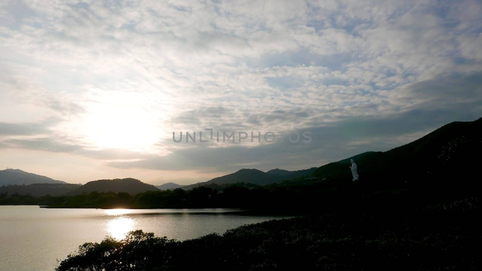 cloudscape and lake landscape photo at sunset