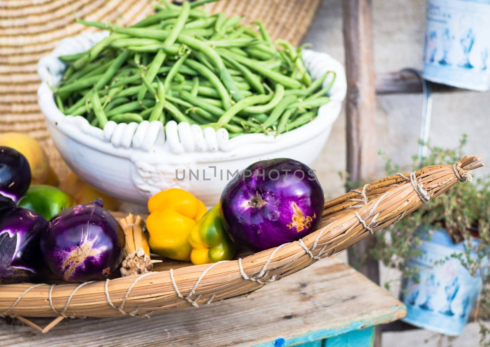eggplant peppers grapes. Fruits and vegetables in season exposed in a street market