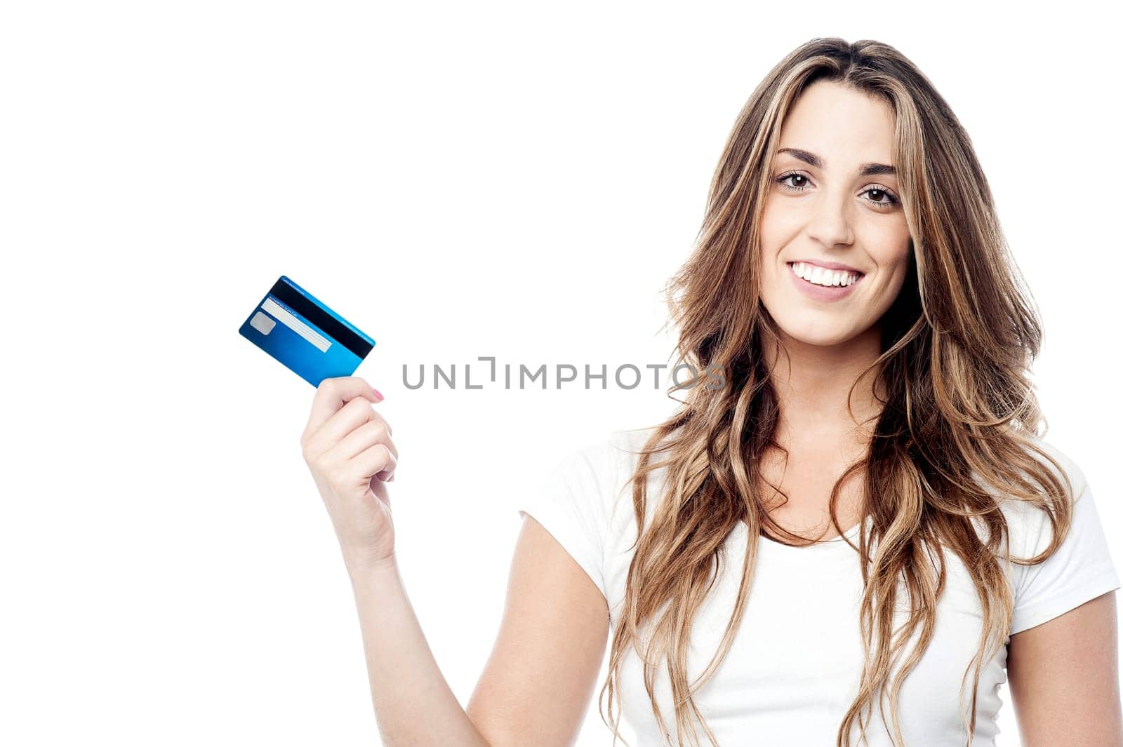 Young girl showing her new credit card to camera