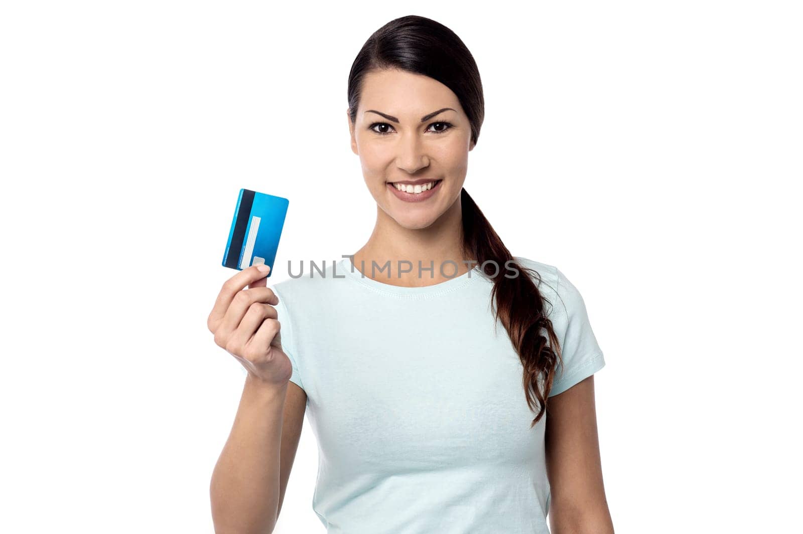 Young woman showing credit card to camera