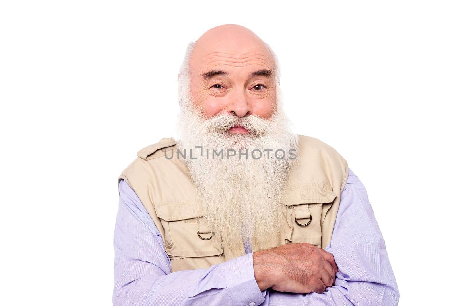 Elderly man with crossed arms wearing jacket