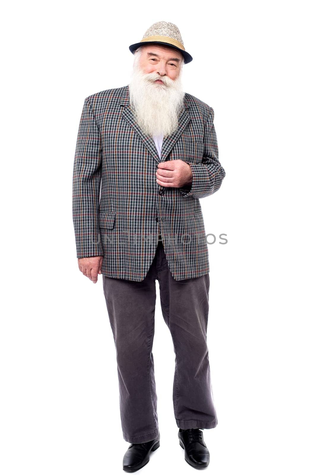 Senior man posing with new suit and straw hat