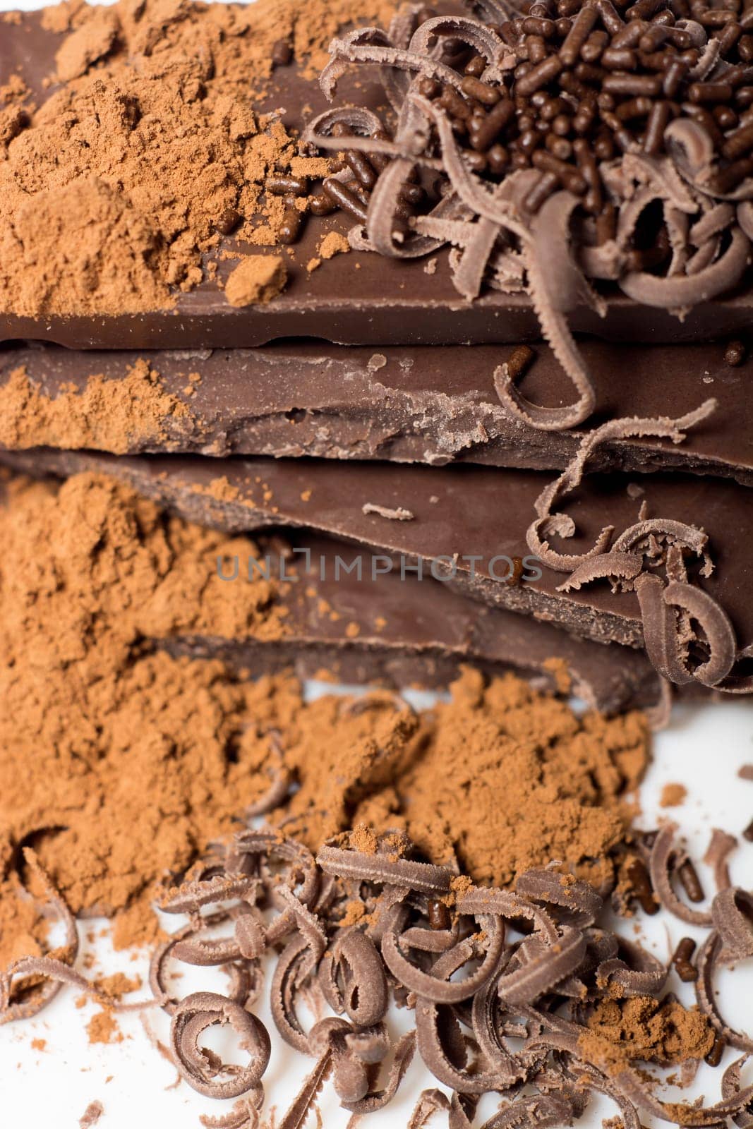 Parts of dark chocolate on the table