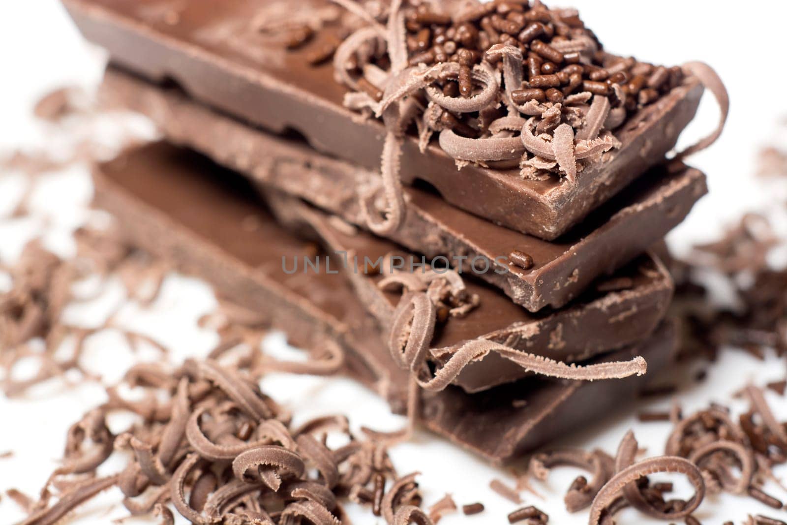 Parts of dark chocolate on the table