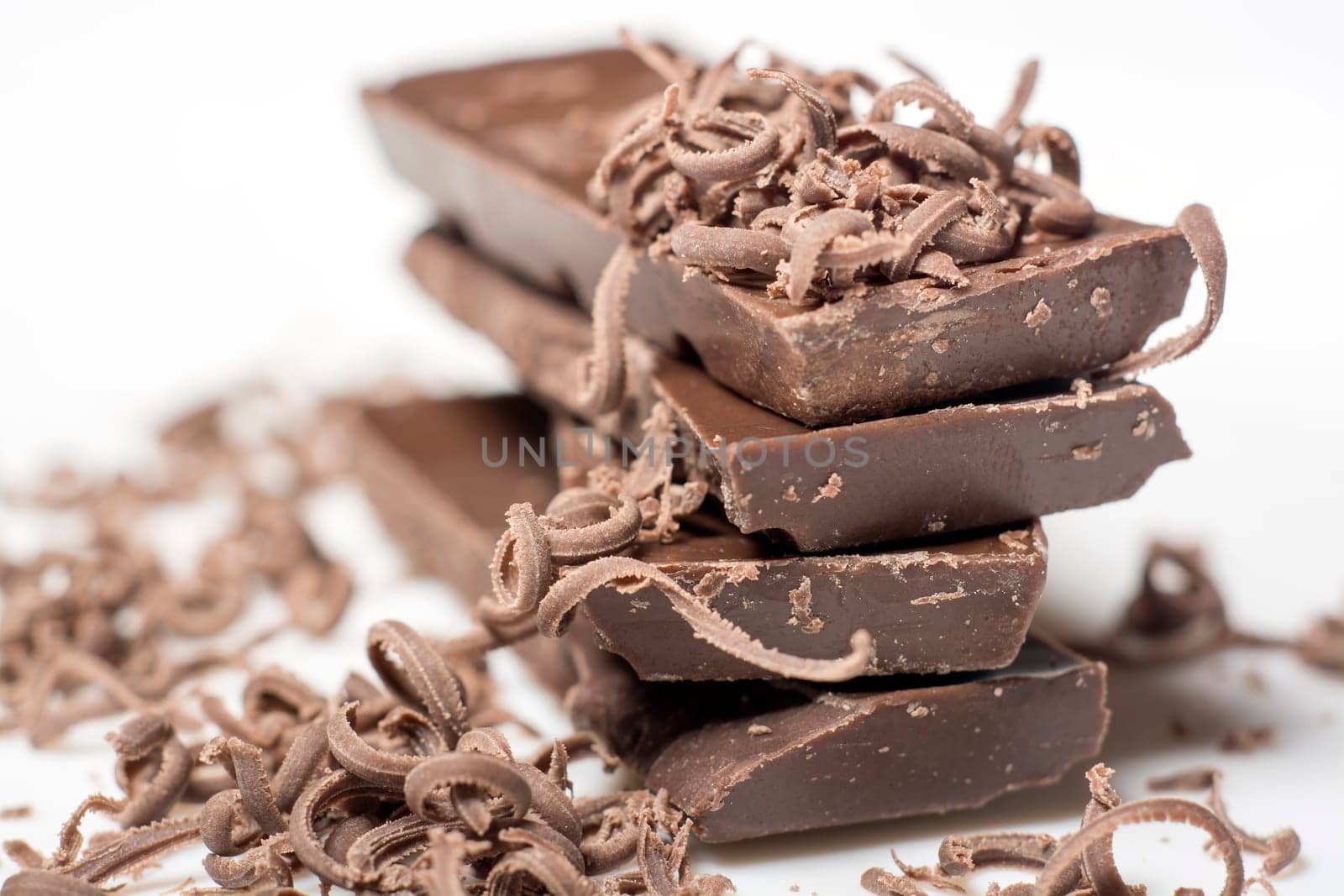Parts of dark chocolate on the table