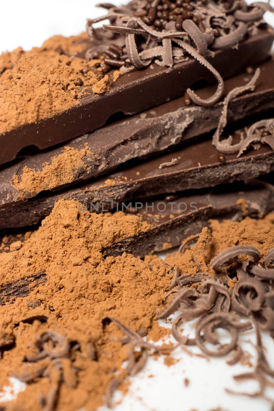 Parts of dark chocolate on the table