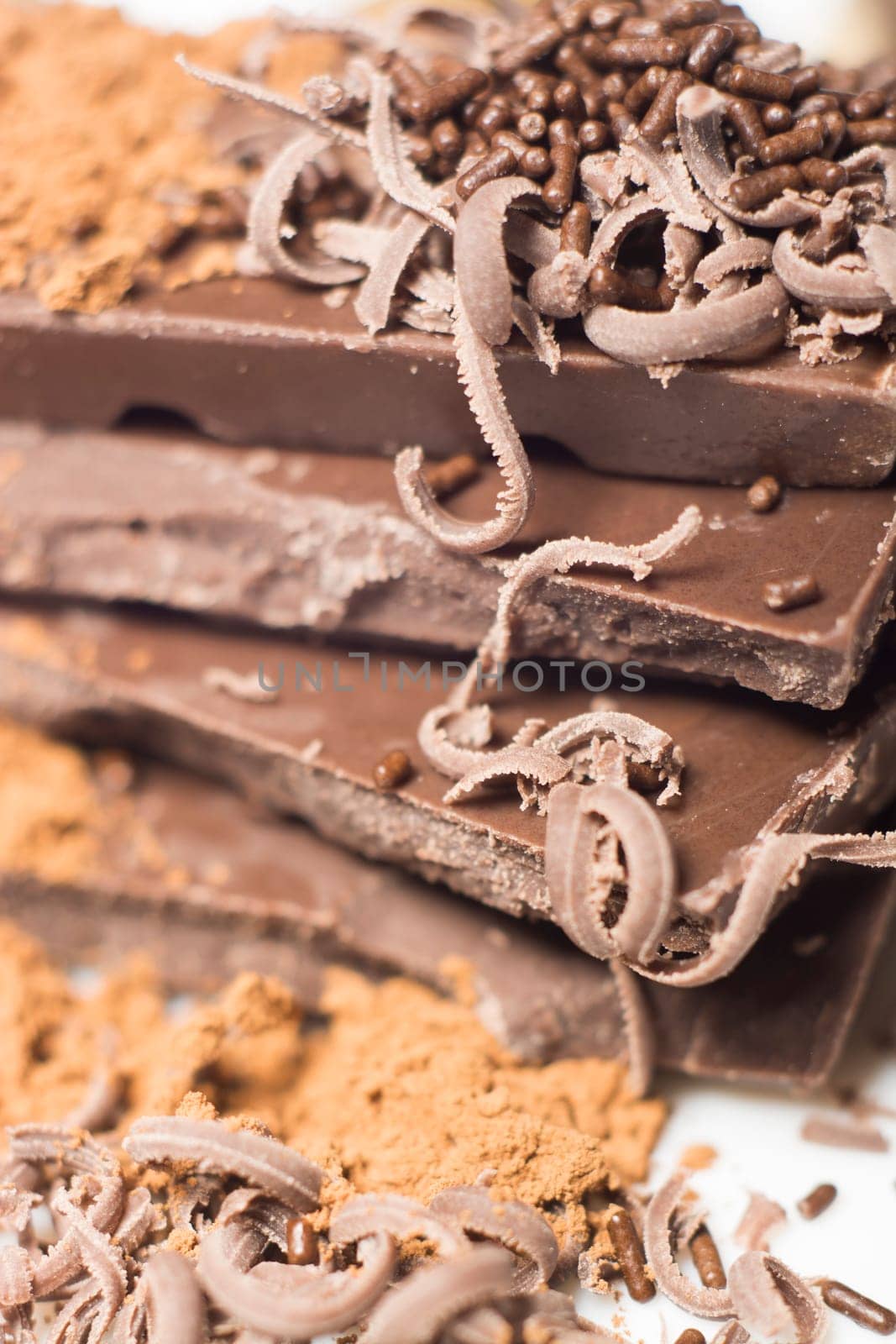 Parts of dark chocolate on the table