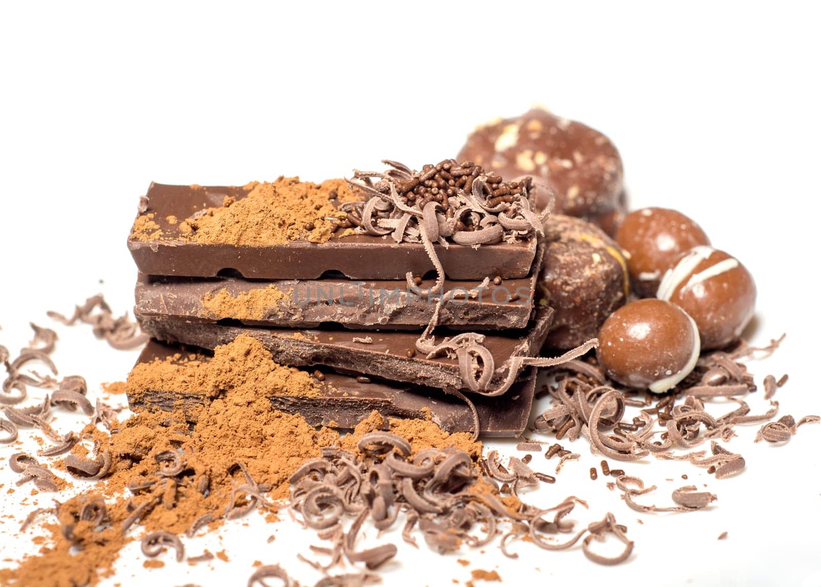 Parts of dark chocolate on the table