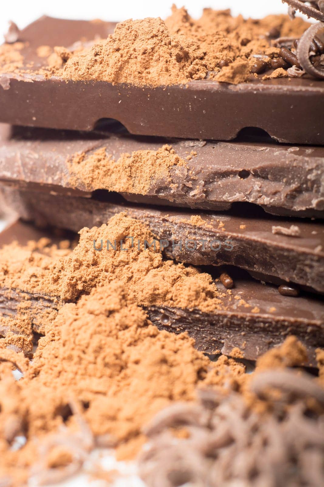 Parts of dark chocolate on the table