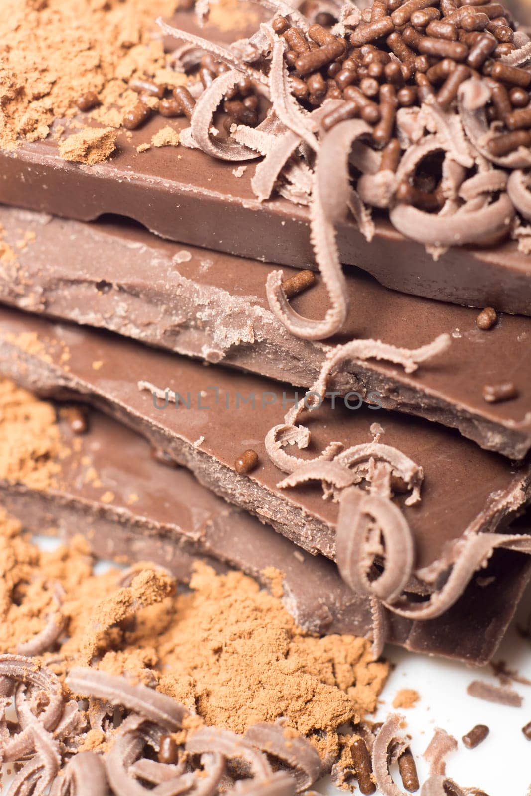Parts of dark chocolate on the table