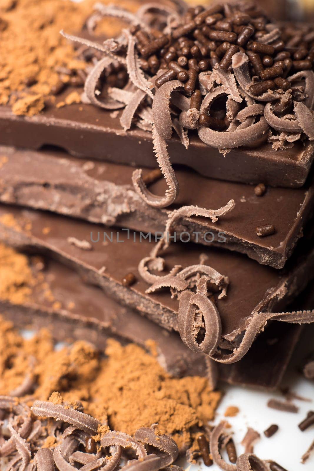 Parts of dark chocolate on the table