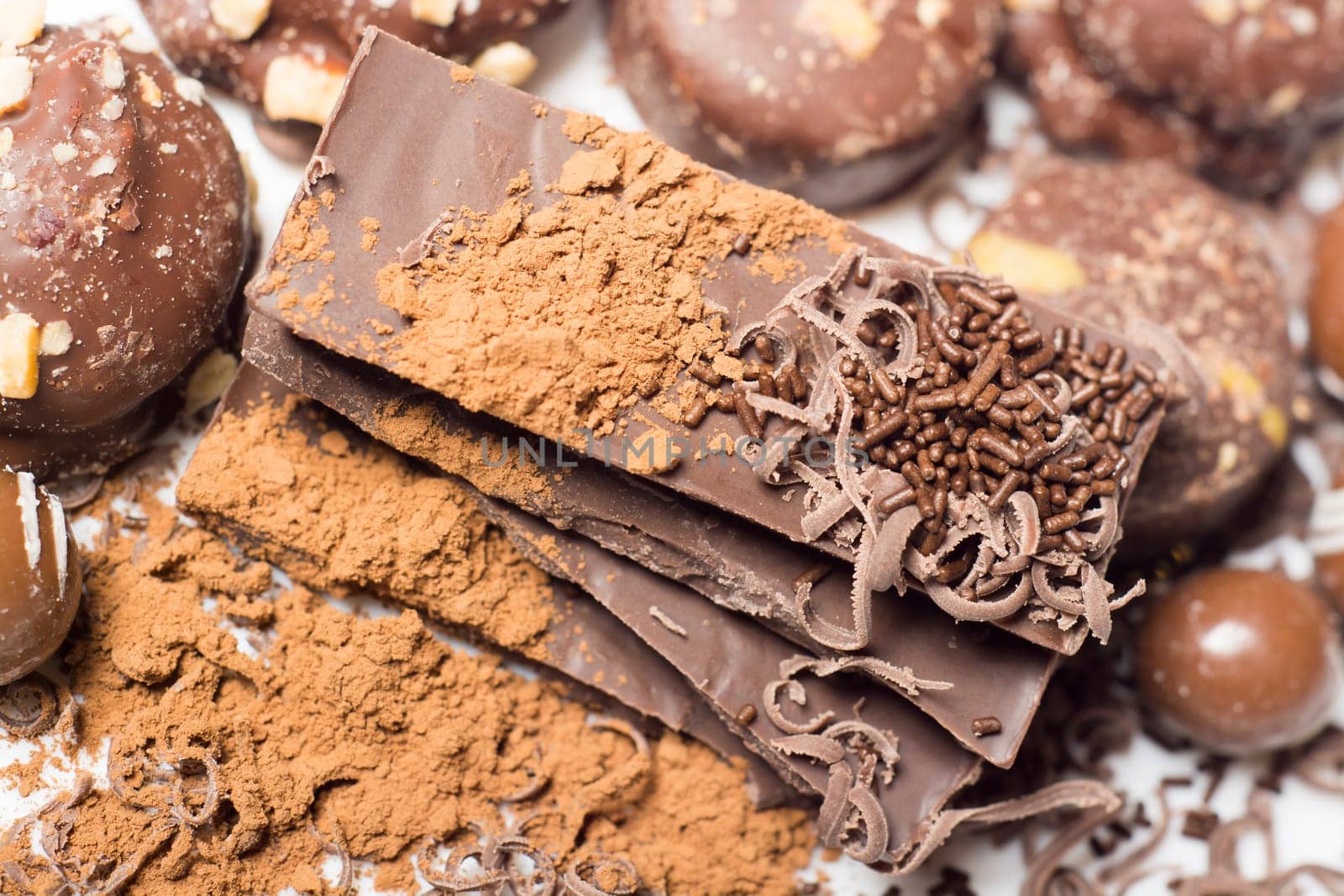 Parts of dark chocolate on the table