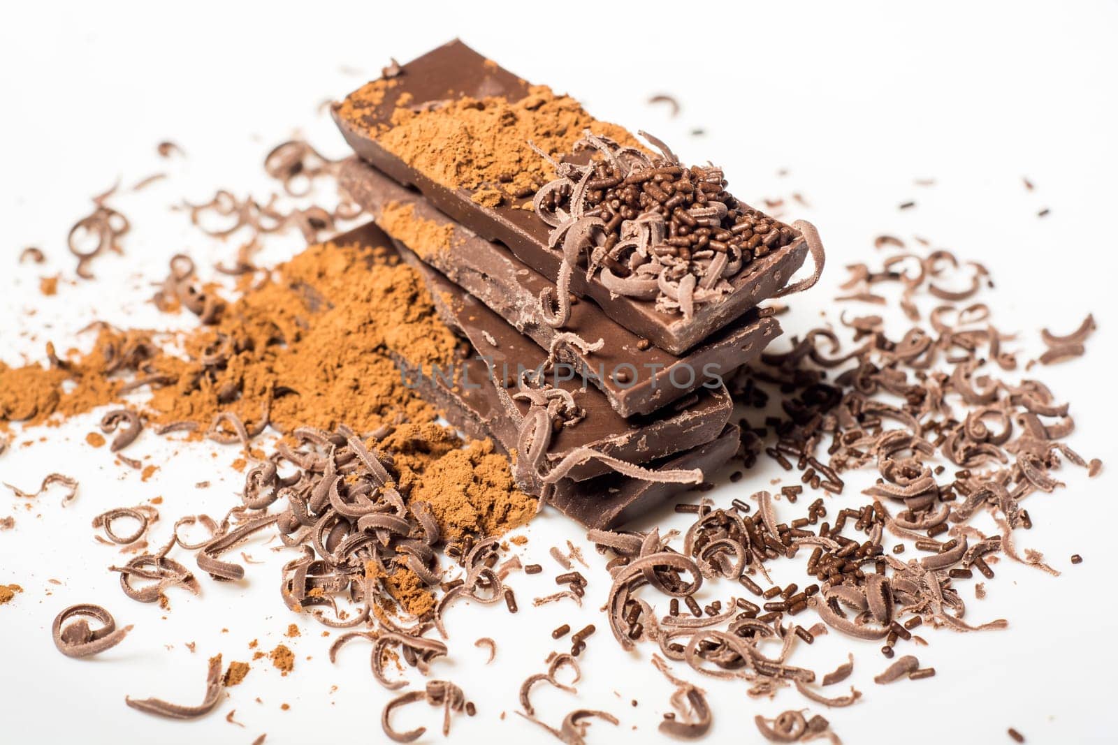 Parts of dark chocolate on the table