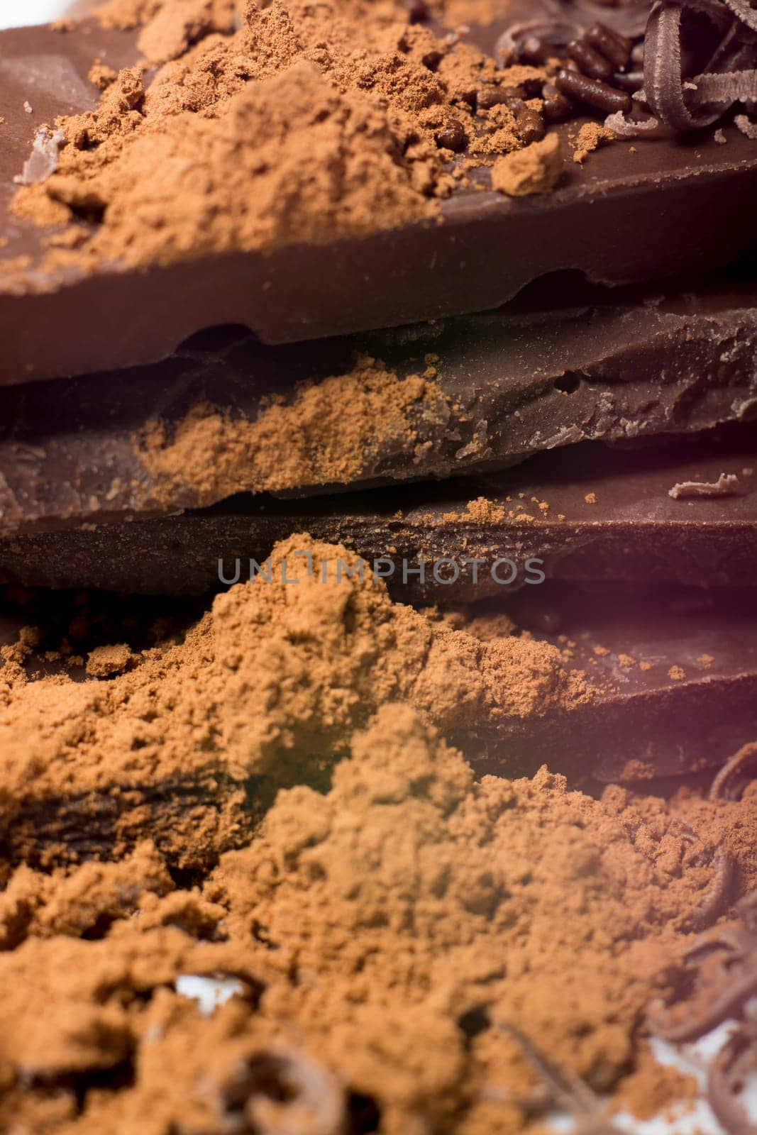 Parts of dark chocolate on the table