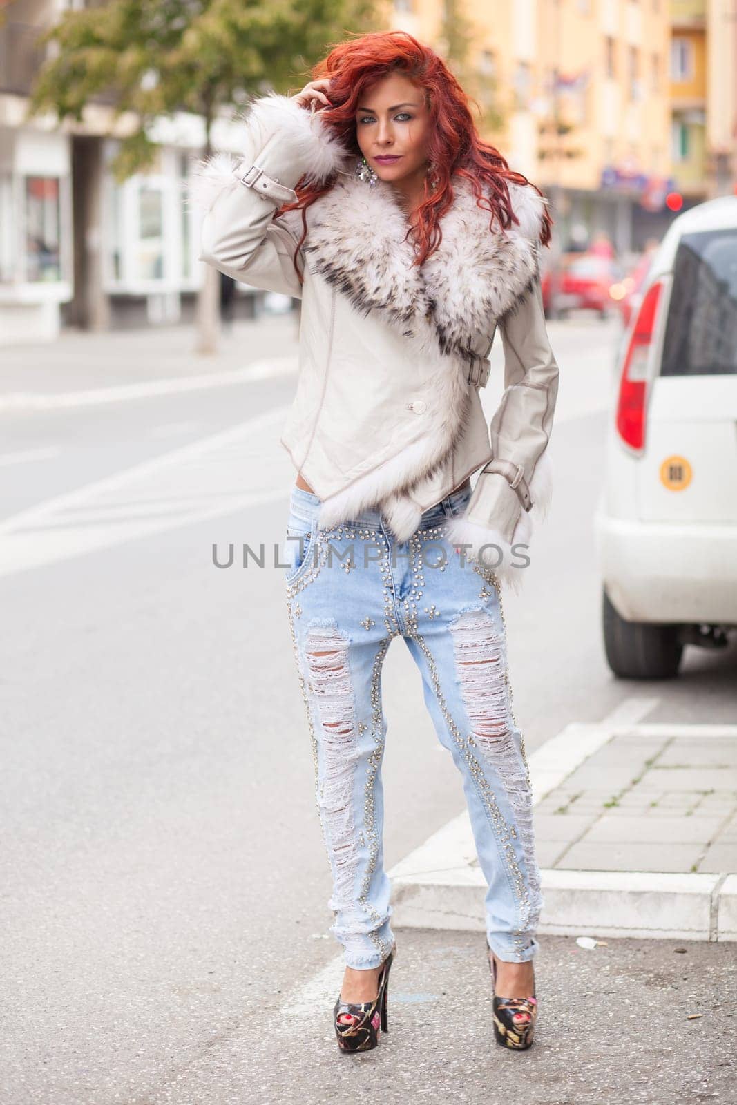 Beautiful Redhair Woman, Fashion Model In Artificial Fur Coat, Outdoor On Street Walking