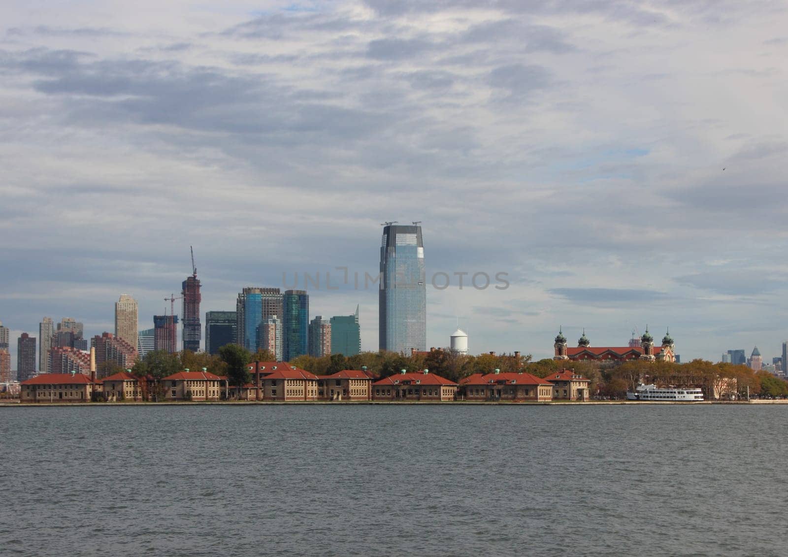 Ellis Island in New York with Hudson River and Skyline Horizon