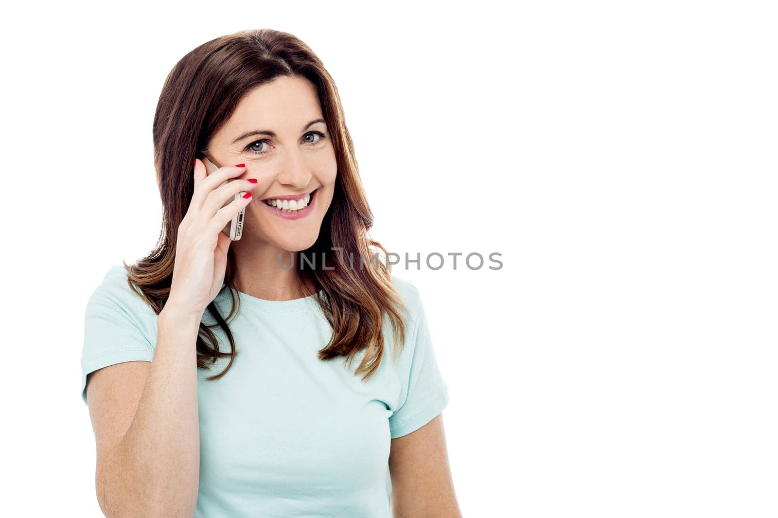 smiling woman using cell phone, isolated on white